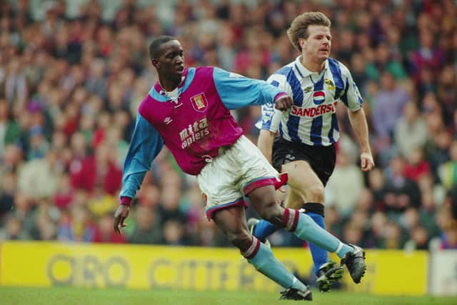 BIRMINGHAM - MARCH 20:  Dwight Yorke of Aston Villa scores his second goal of the match and the winning goal during the FA Premier Leage match between Aston Villa and Sheffield Wednesday held on March 20, 1993 at Villa Park, in Birmingham, England. Aston Villa won the match 2-0. (Photo by Chris Cole/Getty Images)