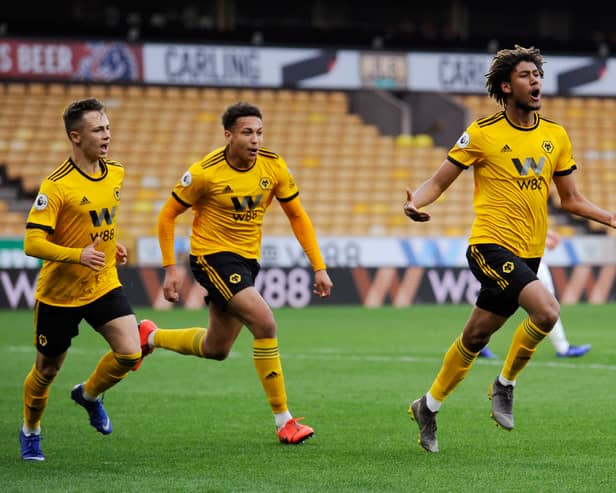 WOLVERHAMPTON, ENGLAND - APRIL 15: Dion Sanderson of Wolverhampton Wanderers celebrates scoring his team's first goal during the Premier League 2 match between Wolverhampton Wanderers U23 and Stoke City U23 at Molineux on April 15, 2019 in Wolverhampton, England. (Photo by Alex Burstow/Getty Images)