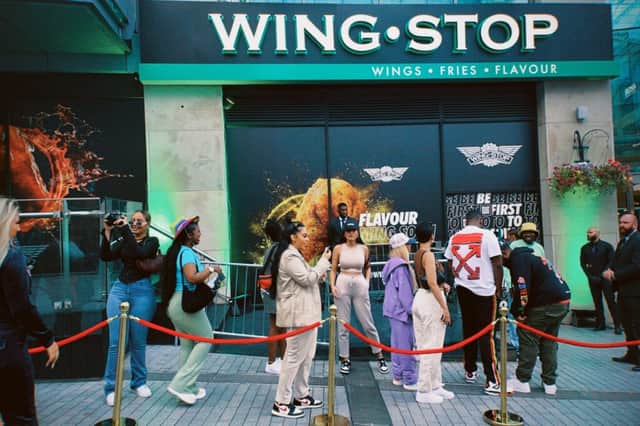 Wingstop fans line up to attend the launch party of the Bullring branch