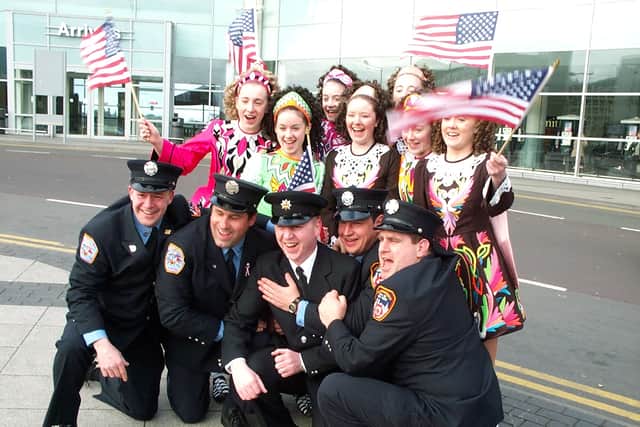 FDNY fire fighters Andy Horan, Mark Jarmek, Gregg Straub and Jimmy Bevers visit Birmingham for the first time in 2002: Pictured with Paul and dancers from Scanlon School of Irish Dancing in Birmingham