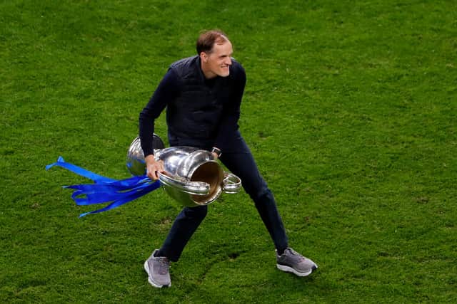 Thomas Tuchel, Manager of Chelsea celebrates with the Champions League Trophy  (Photo by Susan Vera - Pool/Getty Images)