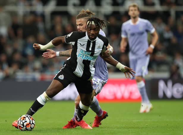<p>Kalvin Phillips of Leeds United vies with Allan Saint- Maximim of Newcastle United during the Premier League match between Newcastle United and Leeds United at St. James Park on September 17, 2021 in Newcastle upon Tyne, England. </p>