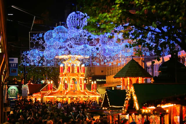 Visitors and Christmas shoppers enjoy Birmingham’s Frankfurt Christmas market on December 3, 2013  (Photo by Christopher Furlong/Getty Images)