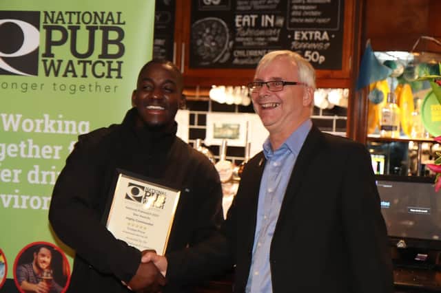 Doorman Tristan Price honoured with award for calmly handling racist abuse from customer at the Figure of Eight