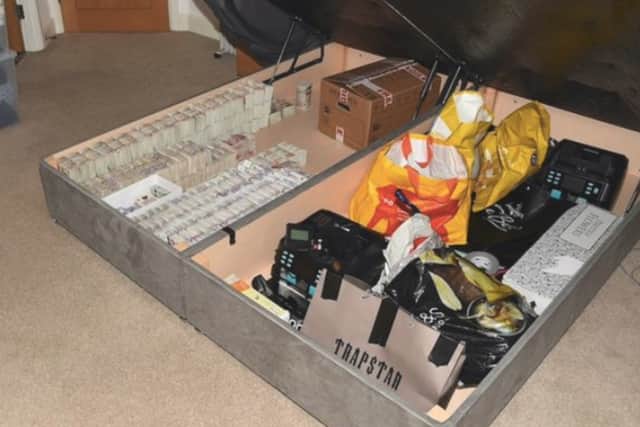Pair arrested in connection with a drugs and money laundering investigation as £1.6 million seized from a flat in Sutton Coldfield