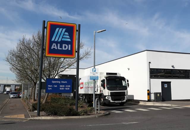 <p>A lorry delivers to an Aldi supermarket (Pic from Getty Images)</p>