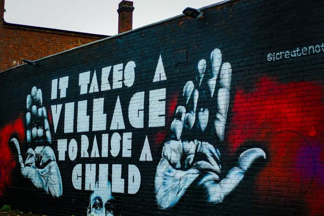 'It takes a village to raise a child' mural in Lozells as part of Gallery37 Downlow project 