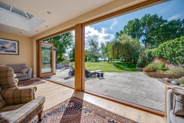 There is a spacious living room, dining room, study, sitting room, and garden room with bi-fold doors overlooking the most private rear gardens and den conveniently located off the recently modernised breakfast kitchen 