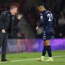 Dean Smith, Manager of Aston Villa speaks with Anwar El Ghazi of Aston Villa during the Premier League match between Southampton and Aston Villa at St Mary's Stadium
