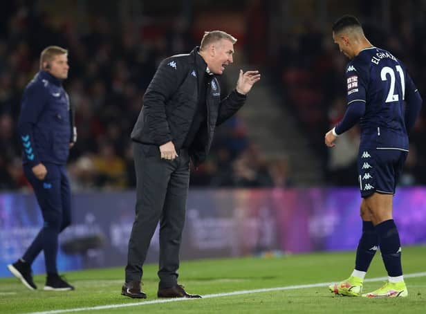 <p>Dean Smith, Manager of Aston Villa speaks with Anwar El Ghazi of Aston Villa during the Premier League match between Southampton and Aston Villa at St Mary's Stadium</p>