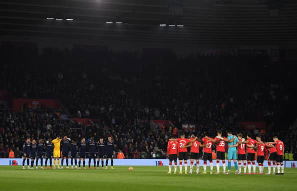 Players, officials and fans observe a minutes silence as part of the Remembrance Day proceedings prior to the Premier League match between Southampton and Aston Villa at St Mary's Stadium