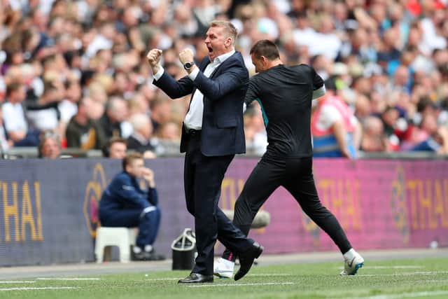 Dean Smith, Manager of Aston Villa celebrates after Anwar El Ghazi of Aston Villa (not pictured) scores his sides first goal during the Sky Bet Championship Play-off Final match between Aston Villa and Derby County at Wembley Stadium