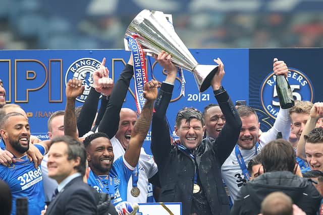 Rangers Manager Steven Gerrard lifts the trophy during the Scottish Premiership match between Rangers and Aberdeen