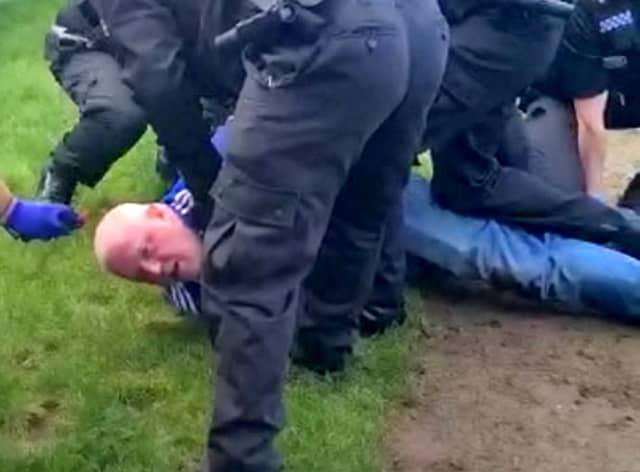 Terminally ill man, Darrell Meekcom, is wrestled to the ground by police. (Photo:  SWNS)