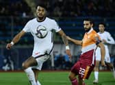 England’s defender Tyrone Mings and San Marino’s defender Manuel Battistini go for the ball during the FIFA World Cup Qatar 2022 qualification Group I football match between San Marino and England