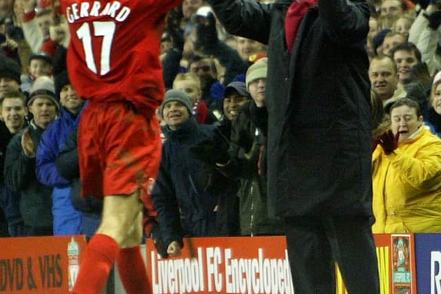 Steven Gerrard of Liverpool celebrates with manager Gerard Houllier after scoring the first goal during the UEFA Cup third round first leg match between Liverpool and Levski Sofia at Anfield 