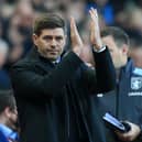 Aston Villa's new English head coach Steven Gerrard applauds supporters as he arrives to take his first game ahead of the English Premier League football match between Aston Villa and Brighton and Hove Albion at Villa Park