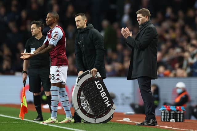 Ashley Young is substituted onto the field by Steven Gerrard, Manager of Aston Villa during the Premier League match between Aston Villa and Brighton & Hove Albion at Villa Park