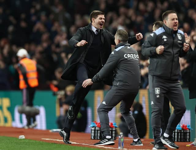 <p>Steven Gerrard celebrates after Ollie Watkins of Aston Villa (not pictured) scores their team's first goal during the Premier League match between Aston Villa and Brighton & Hove Albion at Villa Park</p>