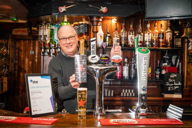 Scruffy Murphy’s manager Paul Phillips celebrates 20 years at the venue 