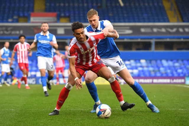 Sam Cosgrove of Birmingham City challenges Jacob Brown of Stoke City during the Sky Bet Championship match between Birmingham City and Stoke City