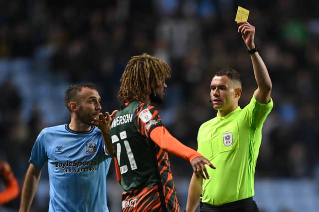 Dion Sanderson of Birmingham City is shown a yellow card by Match Referee, Leigh Doughty during the Sky Bet Championship match between Coventry City and Birmingham City 