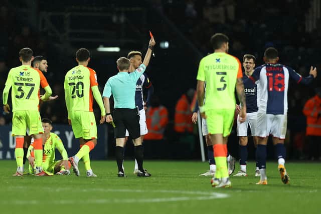 Referee, Gavin Ward shows Jayson Molumby of West Bromwich Albion a second yellow, then red card during the Sky Bet Championship match between West Bromwich Albion and Nottingham Forest