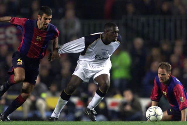 Pep Guardiola in action against Emile Heskey. Credit: Getty.