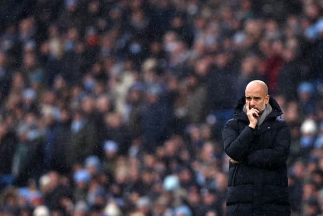 Pep Guardiola, Manager of Manchester City looks on during the Premier League match between Manchester City and West Ham United at Etihad Stadium