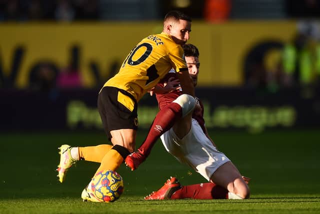 Daniel Podence of Wolverhampton Wanderers battles for possession with Declan Rice of West Ham United during the Premier League match between Wolverhampton Wanderers and West Ham United at Molineux on November 20, 2021 in Wolverhampton, England. (Photo by Nathan Stirk/Getty Images)