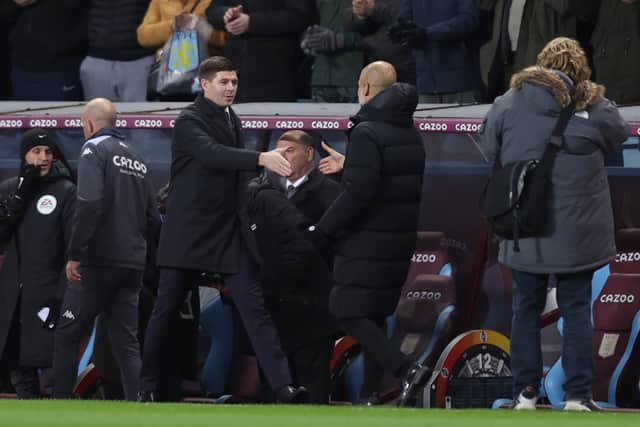 Steven Gerrard, Manager of Aston Villa greets Pep Guardiola, Manager of Manchester City prior to the Premier League match between Aston Villa and Manchester City