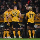 Bruno Lage, Manager of Wolverhampton Wanderers speaks with his players during the Premier League match between Wolverhampton Wanderers and Liverpool