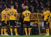 Bruno Lage, Manager of Wolverhampton Wanderers speaks with his players during the Premier League match between Wolverhampton Wanderers and Liverpool