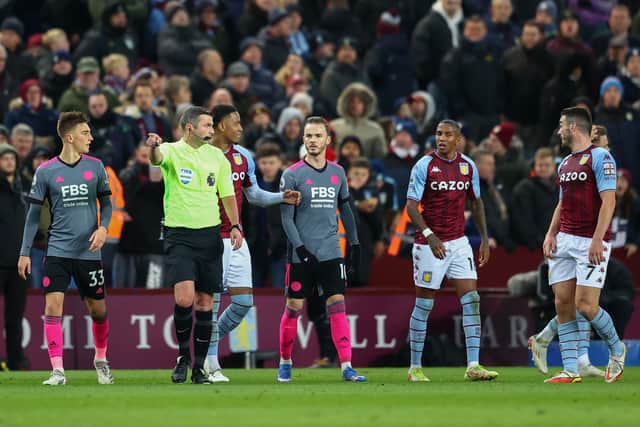 Match Referee Michael Oliver signals to disallow a second goal scored by Jacob Ramsey of Aston Villa for a foul during the Premier League match between Aston Villa  and  Leicester City