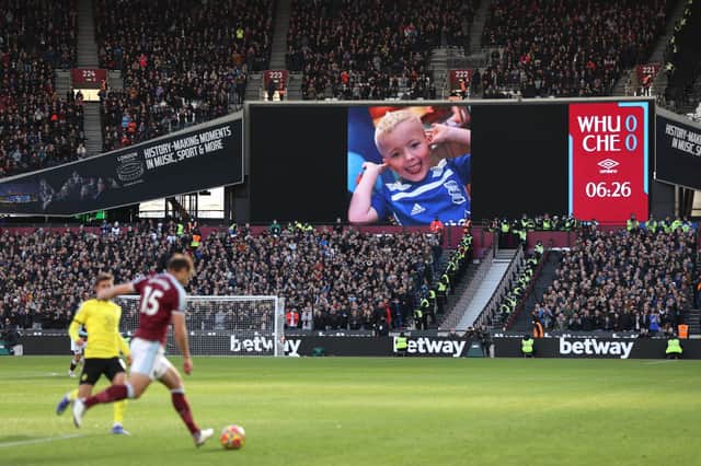 <p>Football fans pay tribute to Arthur Labinjo-Hughes across the country, including the Premier League match between West Ham United and Chelsea on Saturday, December 4)</p>