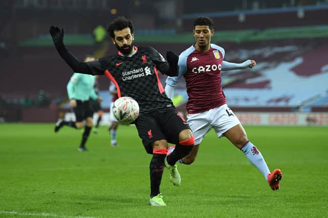 Mohamed Salah of Liverpool under pressure from Callum Rowe of Aston Villa during the FA Cup Third Round match between Aston Villa and Liverpool at Villa Park on January 08, 2021 in Birmingham, England. 