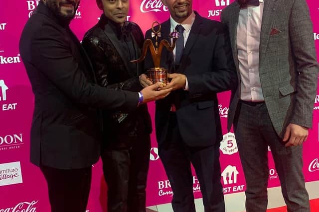 The owner and staff of Pushkar on Broad Street was handed the award by Bollywood star Abhishek Bachchan