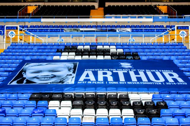 A giant flag with his picture on was also unveiled in the lower Kop of St Andrews