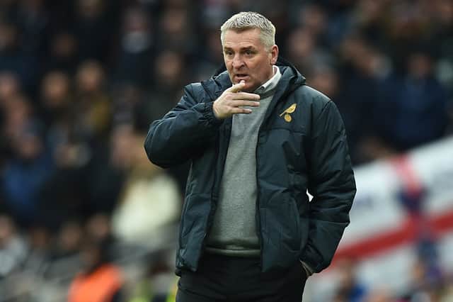 <p>Norwich City's English head coach Dean Smith looks on during the English Premier League football match between Tottenham Hotspur and Norwich City at Tottenham Hotspur Stadium </p>