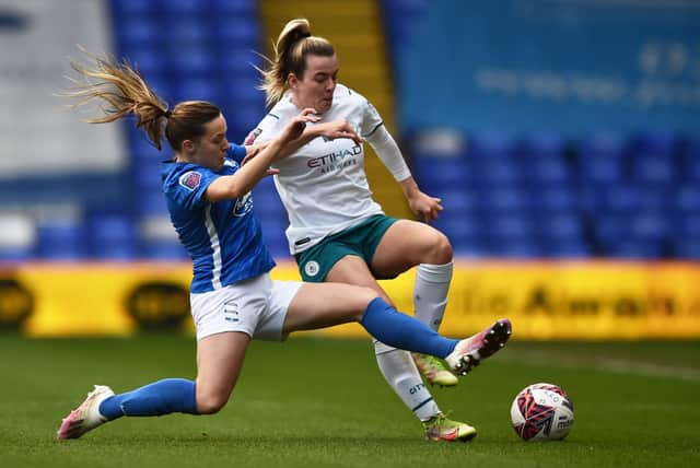 <p>Lauren Hemp of Manchester City Women is tackled by Harriet Scott of Birmingham City during the Barclays FA Women’s Super League match at St Andrew’s Trillion Trophy Stadium on December 12, 2021 (Photo by Nathan Stirk/Getty Images)</p>