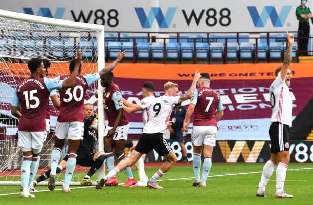 Orjan Nyland carries the ball behind the line but Villa enjoyed one of the biggest slices of luck imaginable against the Blades. Picture by Paul Ellis/Pool via Getty Images