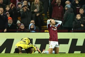 Matty Cash of Aston Villa reacts after fouling Callum Hudson-Odoi of Chelsea leading to a penalty being awarded during the Premier League match between Aston Villa and Chelsea at Villa Park