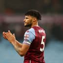 Tyrone Mings of Aston Villa applauds the fans following the Premier League match between Aston Villa and Chelsea at Villa Park