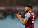 Tyrone Mings of Aston Villa applauds the fans following the Premier League match between Aston Villa and Chelsea at Villa Park