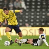 Jake Livermore of West Bromwich Albion battles for possession with Liam Thompson of Derby County during the Sky Bet Championship match between Derby County and West Bromwich Albion at Pride Park Stadium