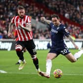 Danny Ings of Aston Villa scores their side's first goal during the Premier League match between Brentford and Aston Villa at Brentford Community Stadium