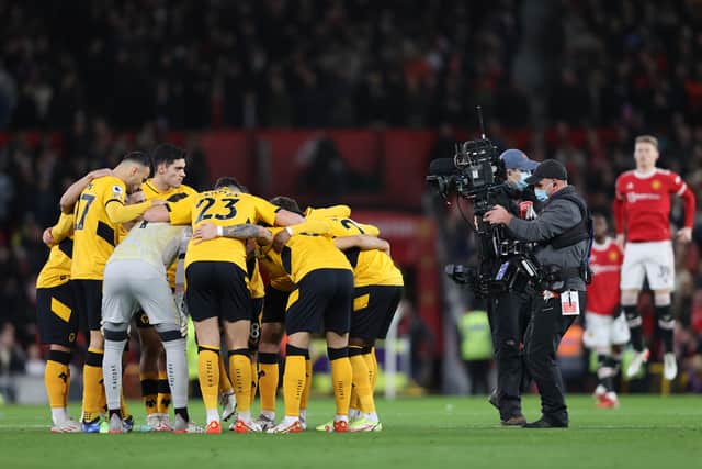 Wolverhampton Wanderers players huddle prior to the Premier League match between Manchester United and Wolverhampton Wanderers at Old Trafford