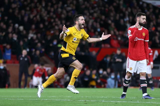 Joao Moutinho of Wolverhampton Wanderers celebrates after scoring their side’s first goal during the Premier League match between Manchester United and Wolverhampton Wanderers at Old Trafford 
