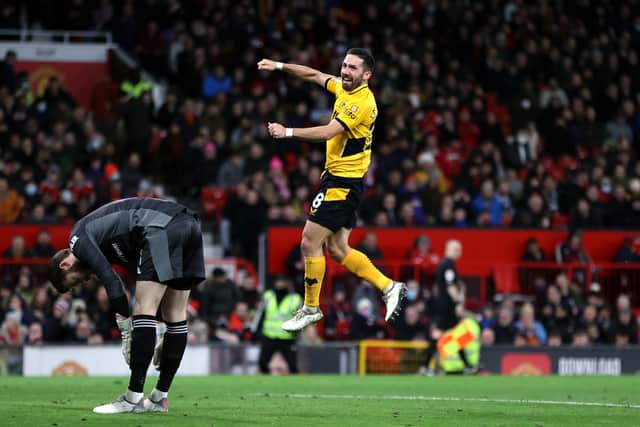  Joao Moutinho of Wolverhampton Wanderers celebrates after scoring their side's first goal during the Premier League match between Manchester United and Wolverhampton Wanderers at Old Trafford