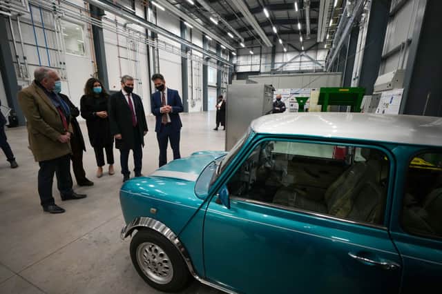  Labour leader Sir Keir Starmer views a classic mini car that has been converted to electric during a tour of Tyseley Energy Park 